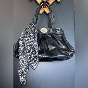 Vintage Black Leather Coach Garnet Satchel handbag with Turlock closure